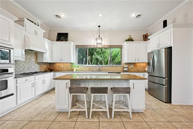 $695,000 | 340 Sandalwood Drive, Mandeville, LA 70448