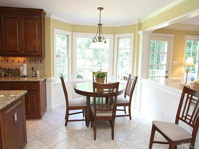 5024 Trail Ridge Drive Raleigh, NC 27613 - Photo 10 of 25 Wonderful view from sunny breakfast room, tile floors, opens to family room Breakfast Room