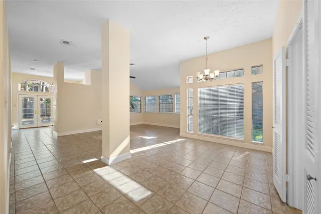 a view of a bathroom with a glass door shower