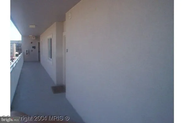 a view of hallway with a window