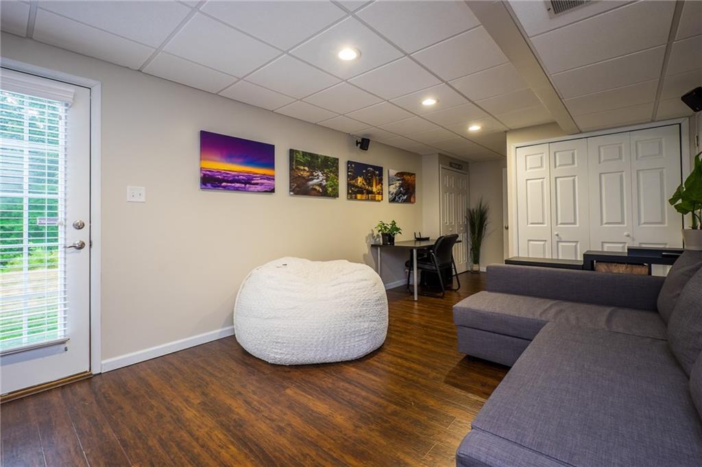 305 Broadstone Drive Mars, PA 16046 - Photo 12 of 25 Enjoy the walk out access to the nice sized level backyard, something you don't find with all townhouses.There is also a separate access door the garage as well.