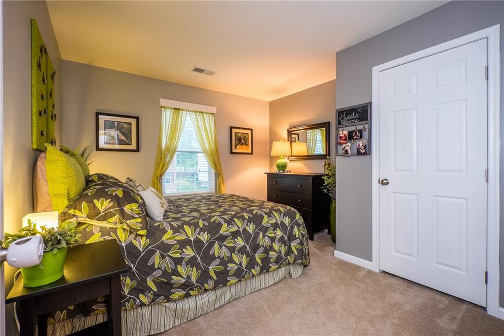 305 Broadstone Drive Mars, PA 16046 - Photo 19 of 25 Delightful 2nd bedroom in gray tones with paneled door closet.
