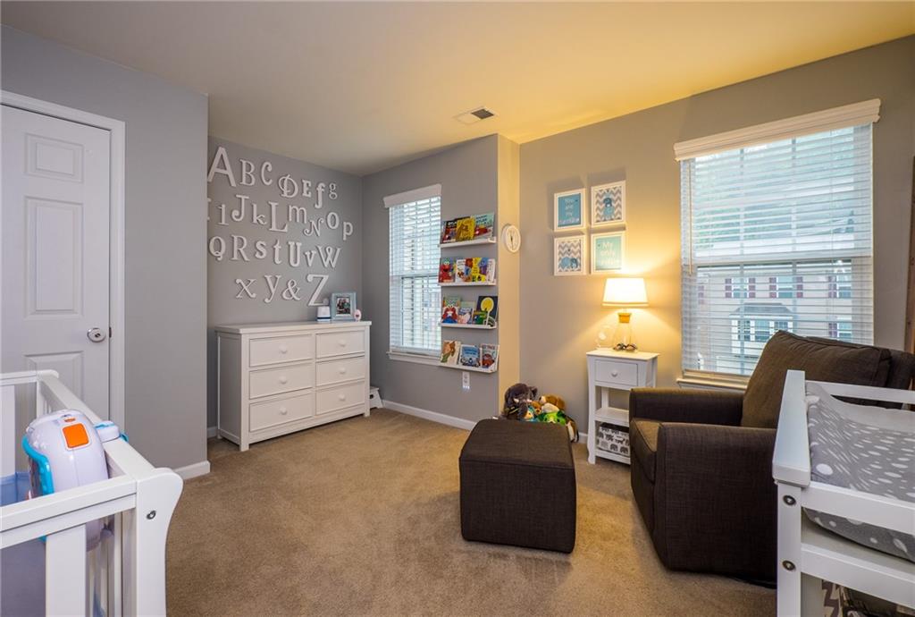305 Broadstone Drive Mars, PA 16046 - Photo 20 of 25 3rd bedroom also has the soft gray tones and paneled closet door as well as 2 windows allowing for plenty of light.
