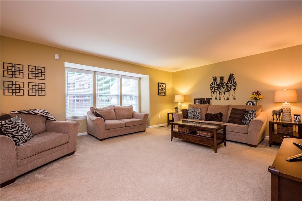 305 Broadstone Drive Mars, PA 16046 - Photo 3 of 25 A large family room done in all neutral colors is a perfect gathering space for lots of friends and family.