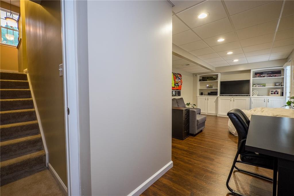 305 Broadstone Drive Mars, PA 16046 - Photo 10 of 25 A superb finished basement is easily accessed from the dual access staircase.