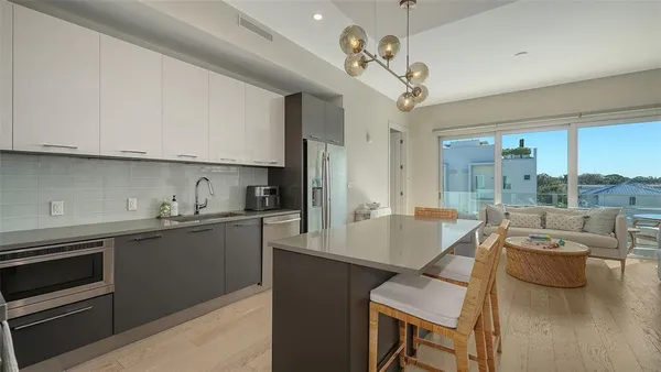 a very nice looking kitchen with a large window