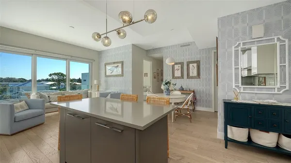 a view of a dining room kitchen with a table and chairs