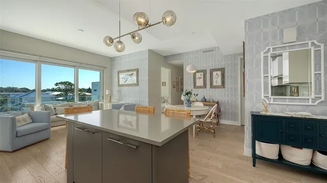 a view of a dining room kitchen with a table and chairs