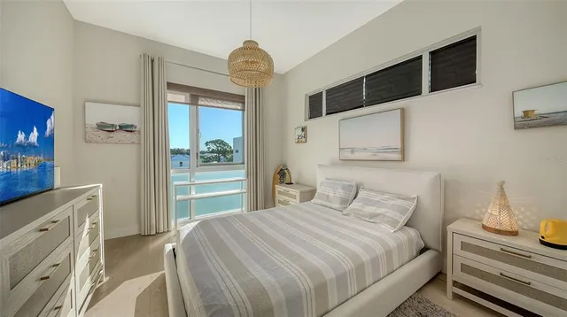 a bedroom with a bed and a dresser