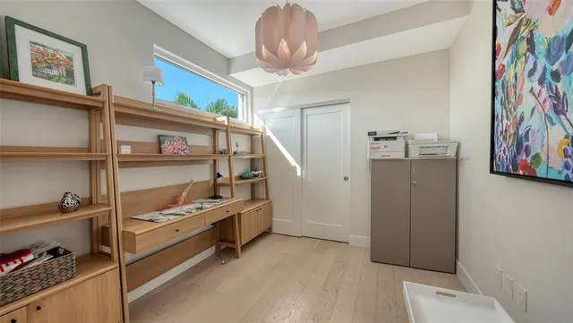 a view of storage and utility room with racks on the wall