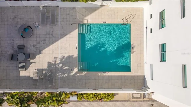 a view of multiple houses with yard