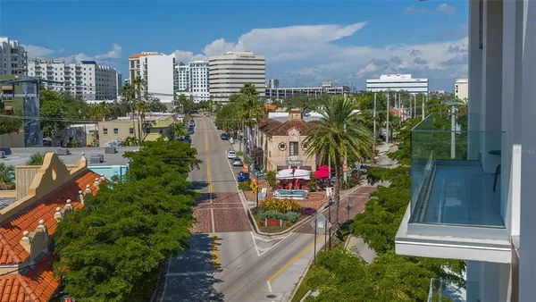 a front view of a building with parking