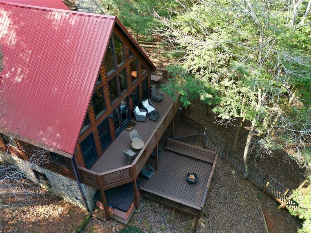 834 Indian Cave Road Ellijay, GA 30536 - Photo 37 of 44 a view of outdoor space with seating area and trees
