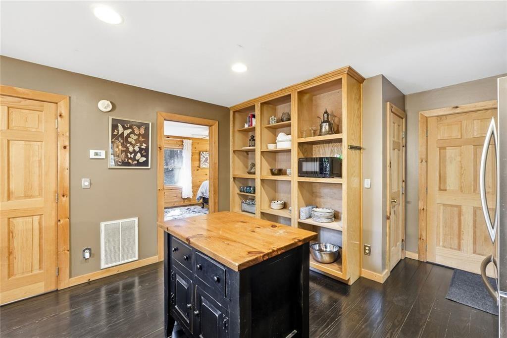 834 Indian Cave Road Ellijay, GA 30536 - Photo 6 of 44 a view of kitchen with stainless steel appliances granite countertop a stove and a refrigerator