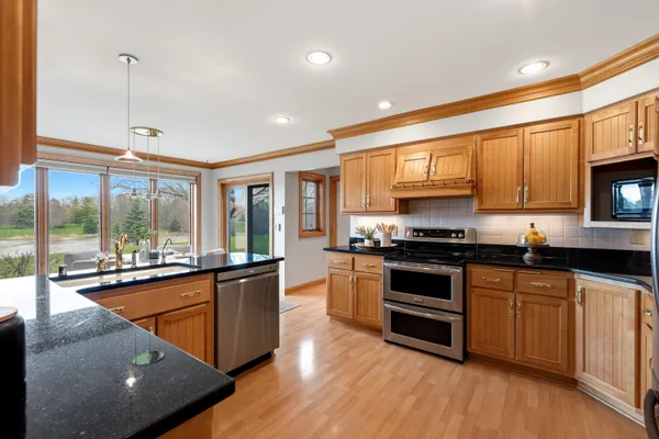 $900,000 | 702 West Haddonstone Place, Mequon, WI 53092