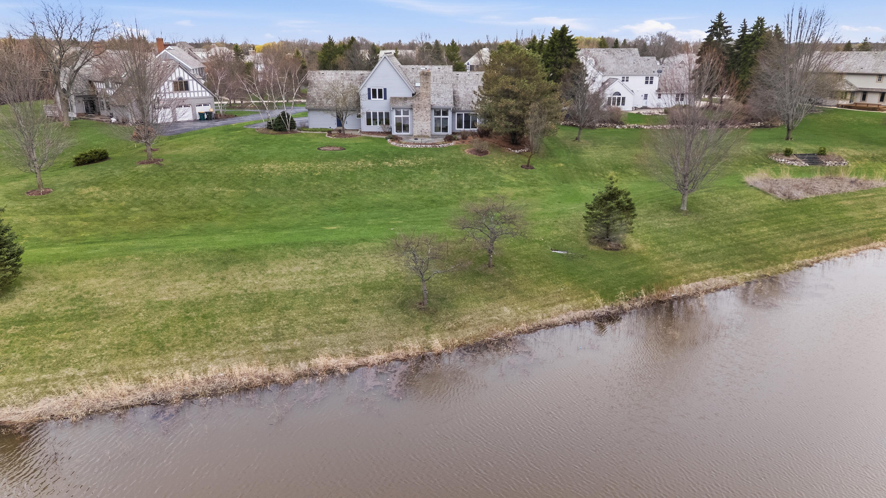 702 West Haddonstone Place Mequon, WI 53092 - Photo 37 of 49 Rear Yard Pond