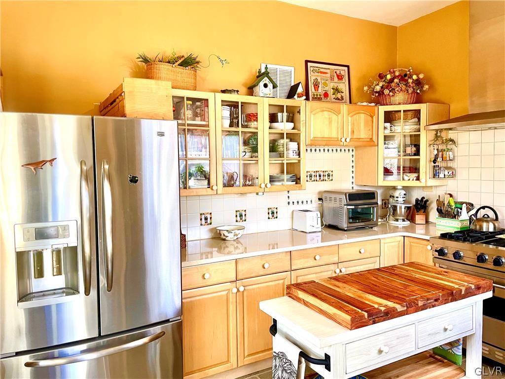 2030 Park Road Easton, PA 18045 - Photo 13 of 40 a view of a kitchen with stainless steel appliances granite countertop a refrigerator and a stove top oven