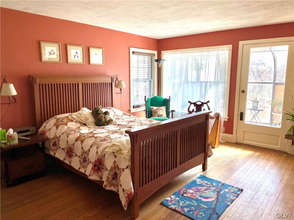 2030 Park Road Easton, PA 18045 - Photo 16 of 40 a bed sitting in a bedroom next to a window