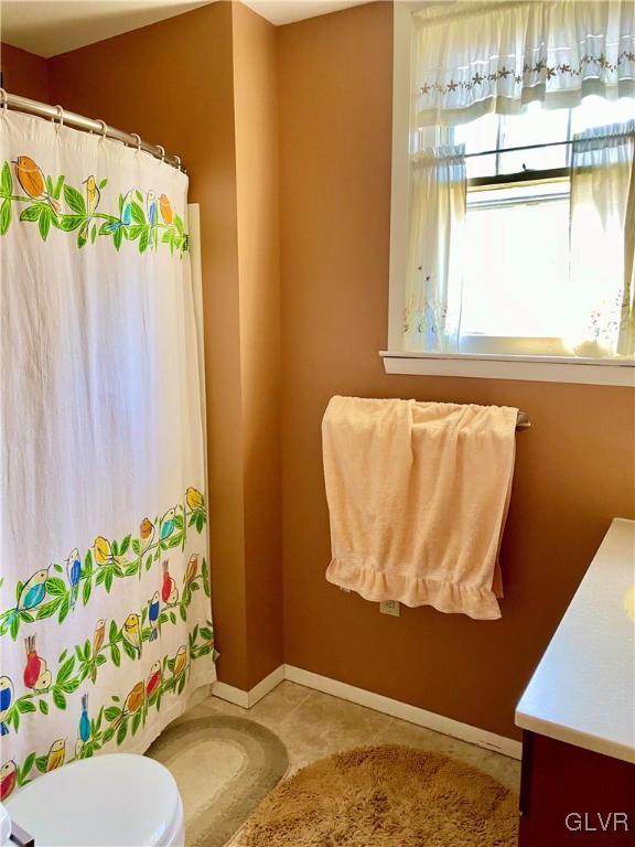 2030 Park Road Easton, PA 18045 - Photo 21 of 40 a bathroom with a sink toilet and window