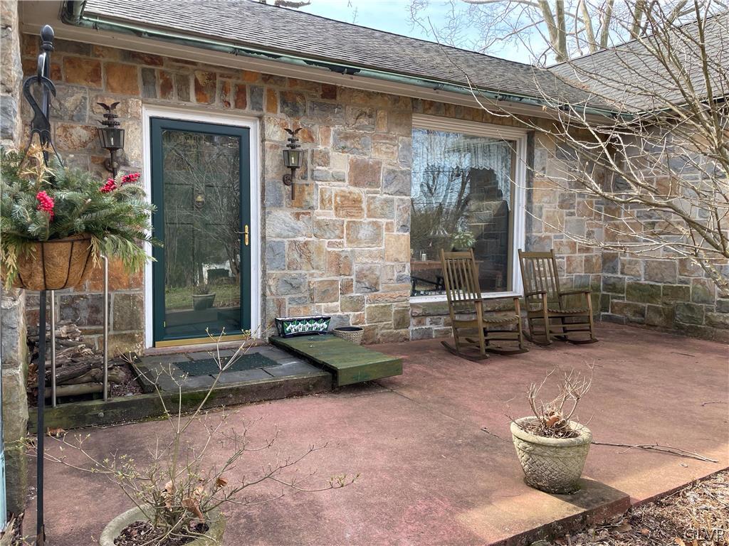 2030 Park Road Easton, PA 18045 - Photo 30 of 40 a view of a chair and table in backyard of the house