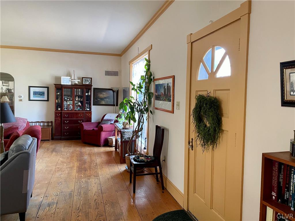 2030 Park Road Easton, PA 18045 - Photo 3 of 40 a livingroom with furniture and a potted plant
