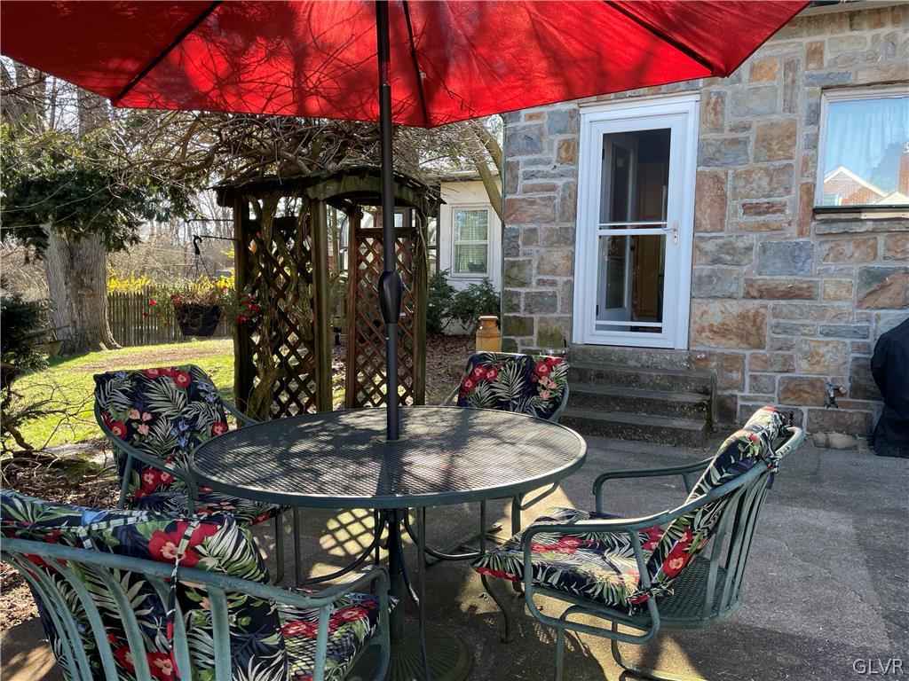2030 Park Road Easton, PA 18045 - Photo 31 of 40 a view of a chairs and table in the patio