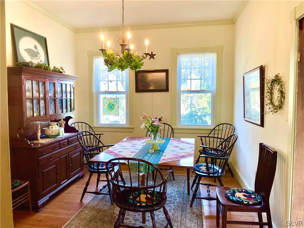 2030 Park Road Easton, PA 18045 - Photo 8 of 40 a view of a dining room with furniture and a chandelier