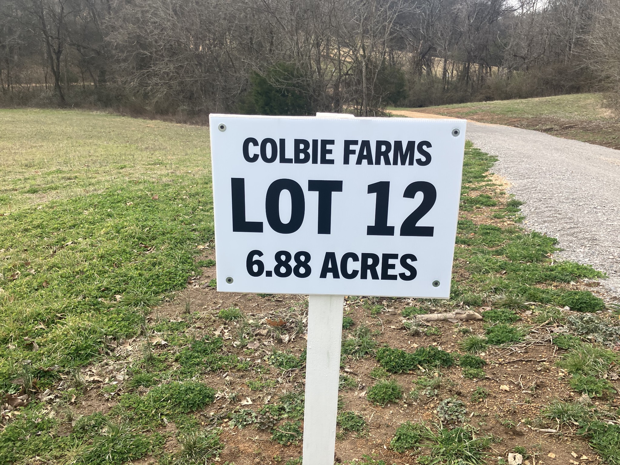 12 Booker Ridge Road Mount Pleasant, TN 38474 - Photo 2 of 8 a sign that is on the side of a building