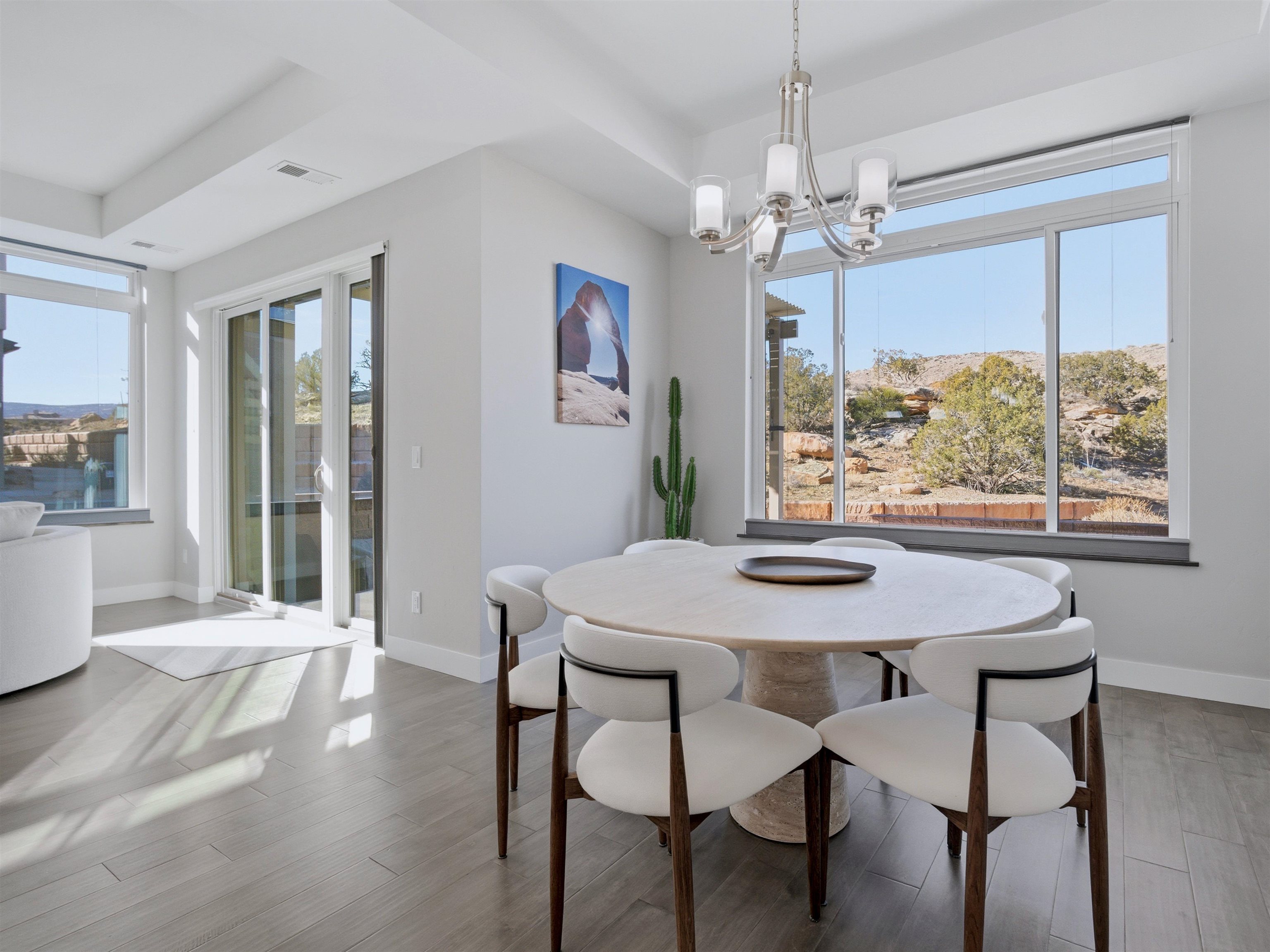 380 West Ridges Boulevard, Unit A Grand Junction, CO 81507 - Photo 12 of 41 a view of a dining room with furniture window and wooden floor