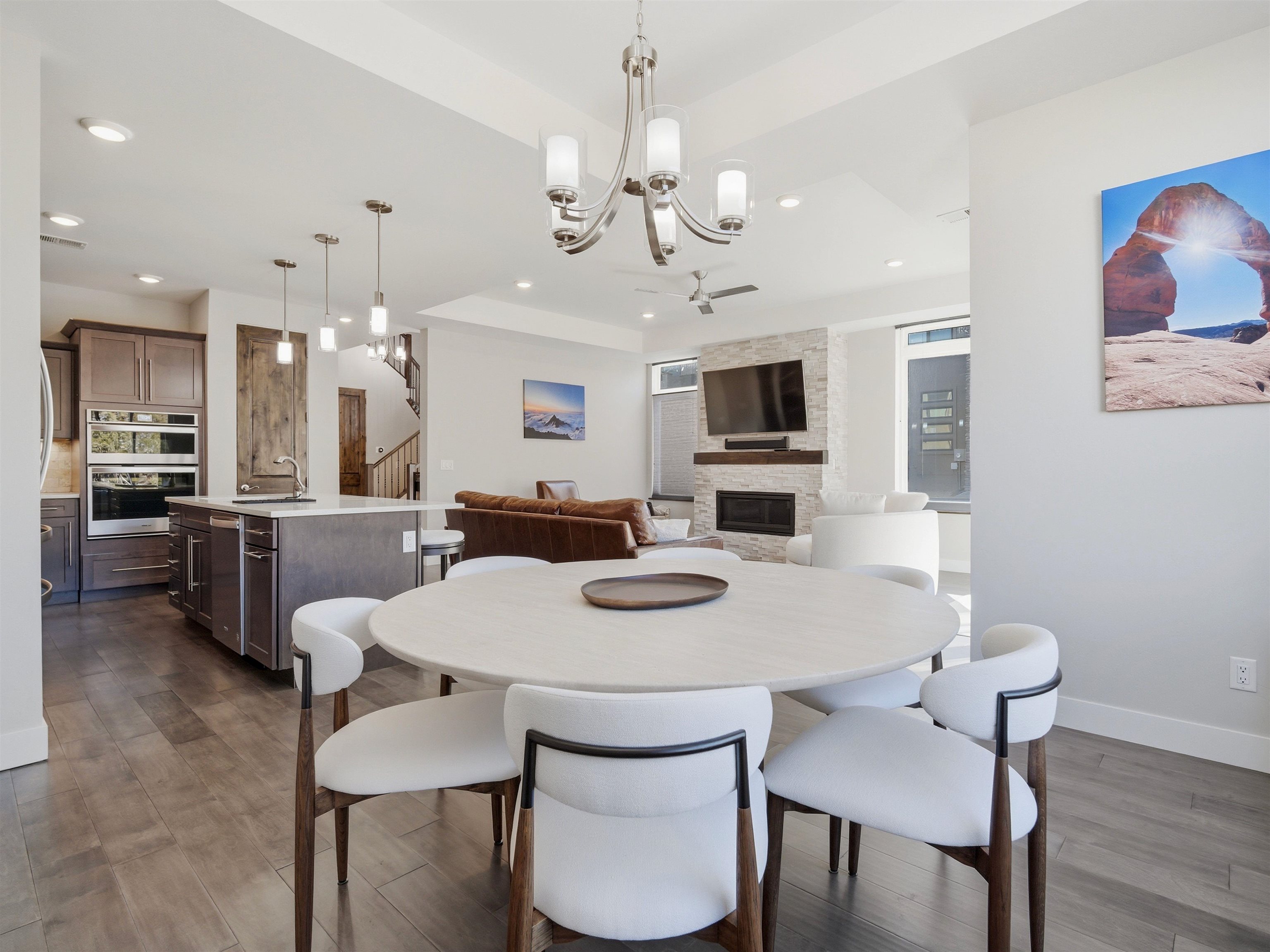 380 West Ridges Boulevard, Unit A Grand Junction, CO 81507 - Photo 13 of 41 a view of a dining room with furniture and wooden floor