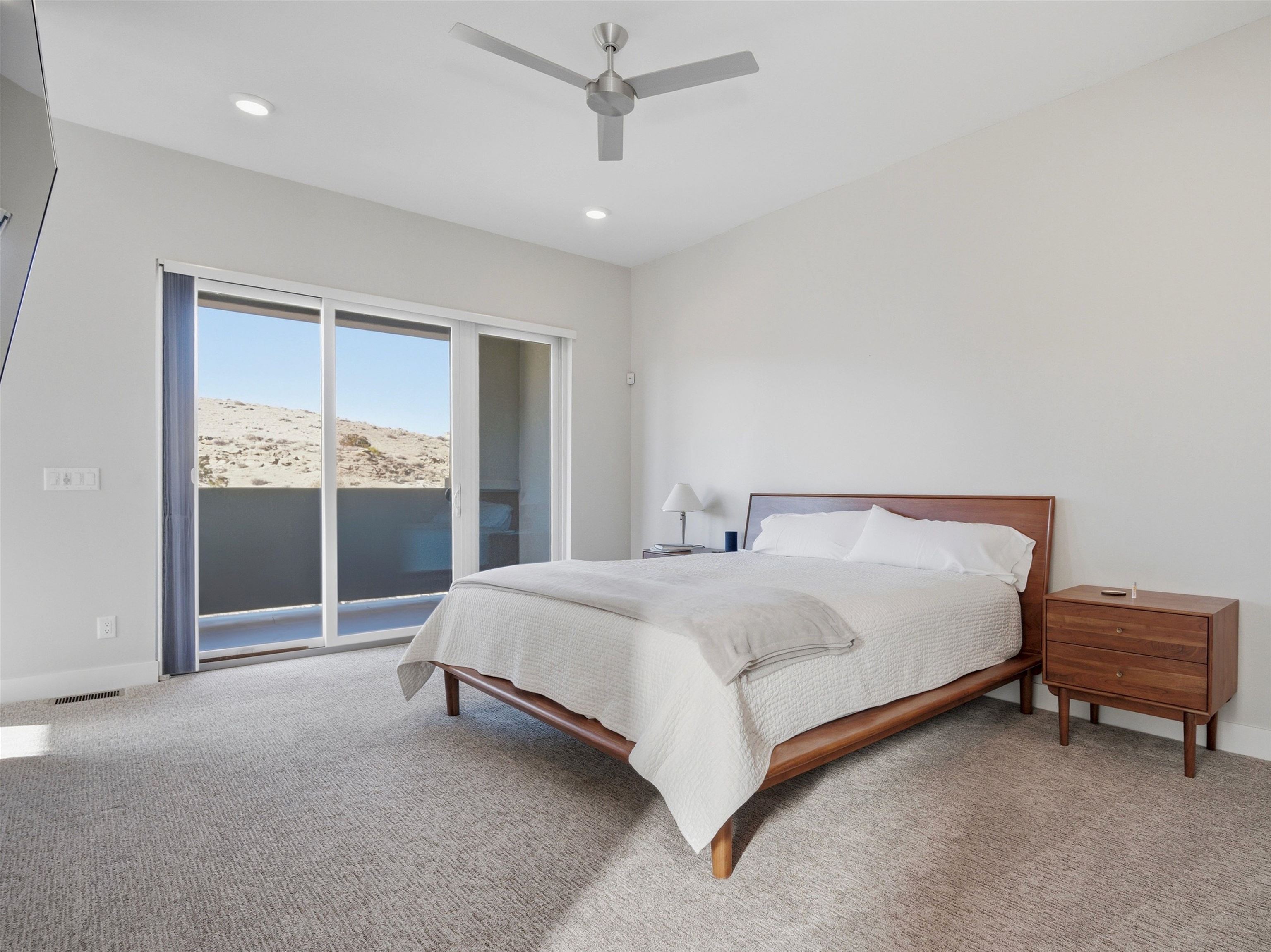 380 West Ridges Boulevard, Unit A Grand Junction, CO 81507 - Photo 15 of 41 a bedroom with a bed and a window