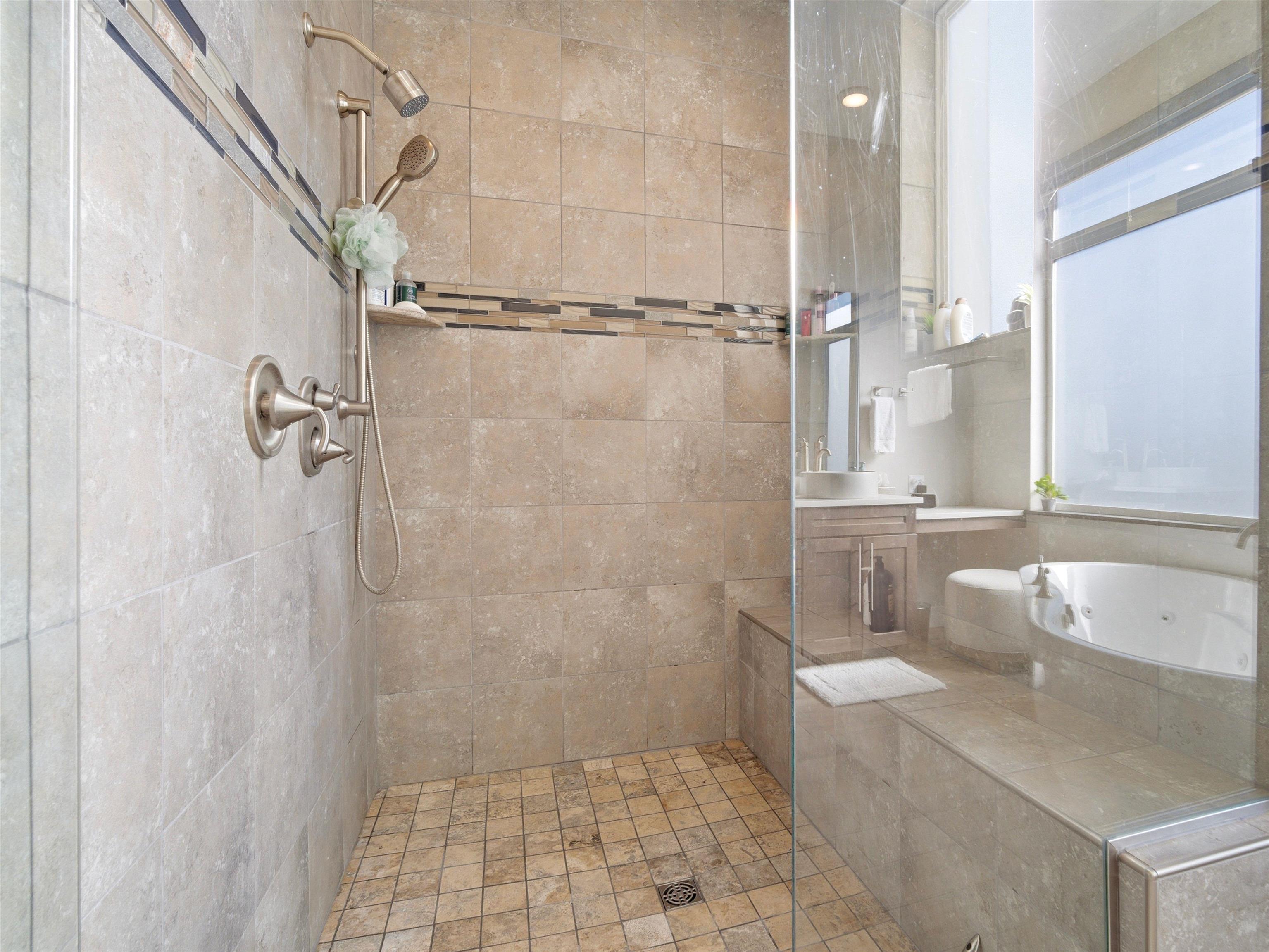 380 West Ridges Boulevard, Unit A Grand Junction, CO 81507 - Photo 18 of 41 a bathroom with a granite countertop shower