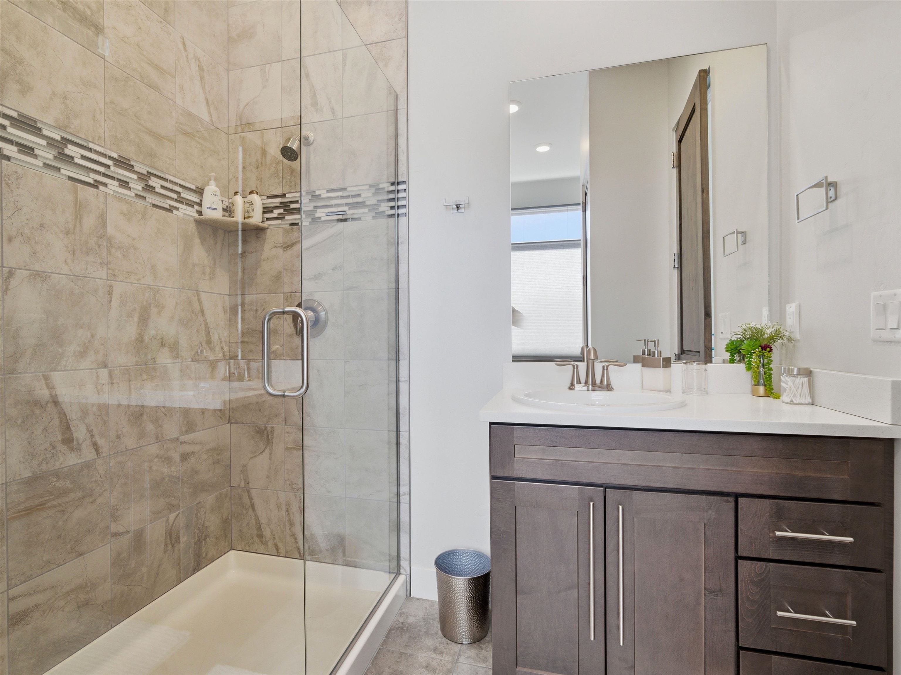 380 West Ridges Boulevard, Unit A Grand Junction, CO 81507 - Photo 23 of 41 a bathroom with a sink and a mirror