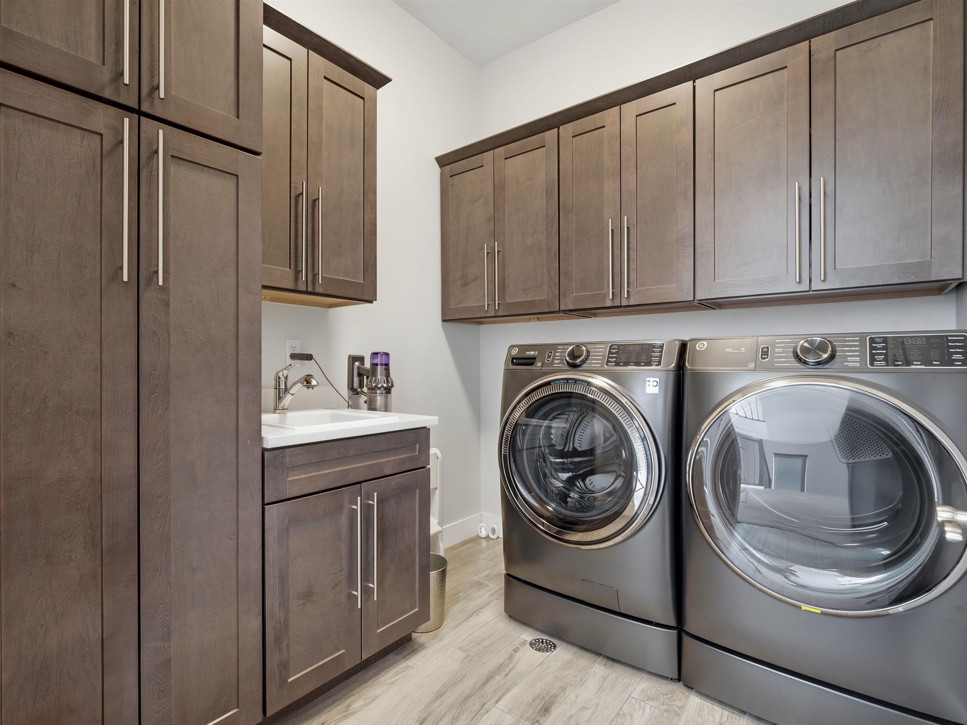 380 West Ridges Boulevard, Unit A Grand Junction, CO 81507 - Photo 27 of 41 a utility room with sink dryer and washer