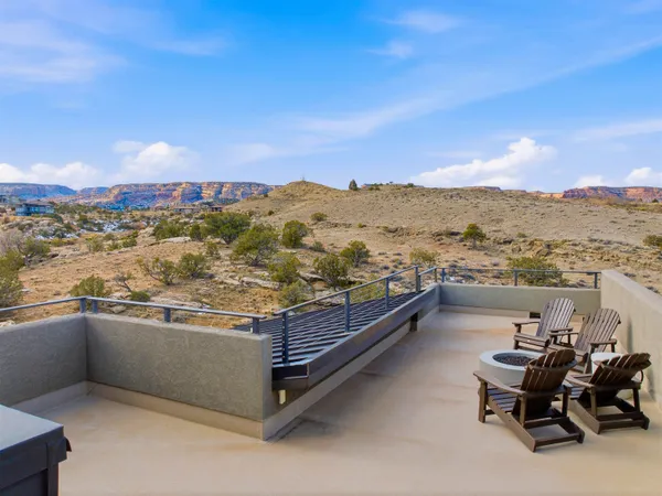 a view of a terrace with chairs
