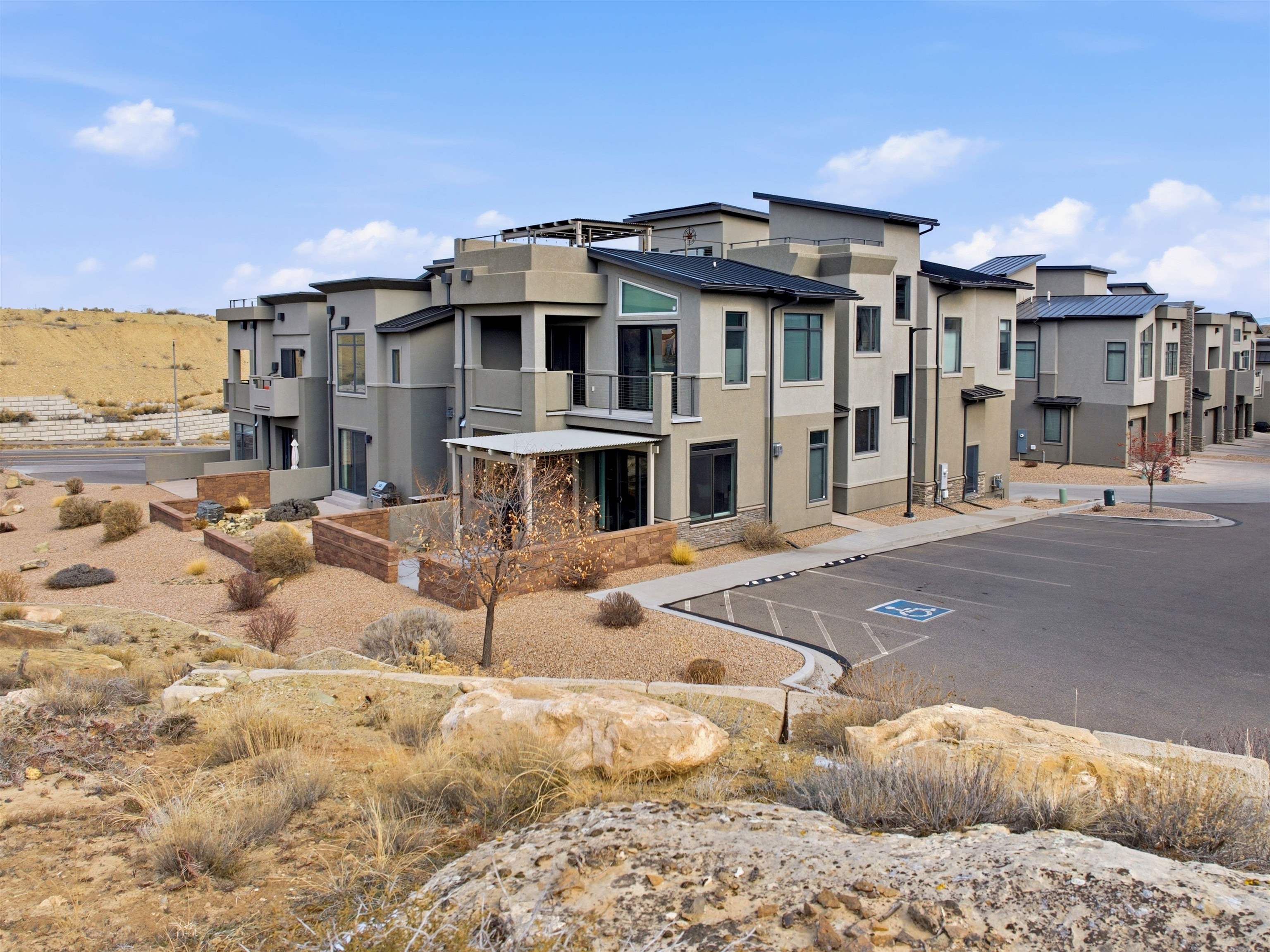 380 West Ridges Boulevard, Unit A Grand Junction, CO 81507 - Photo 36 of 41 a view of multiple houses with a yard