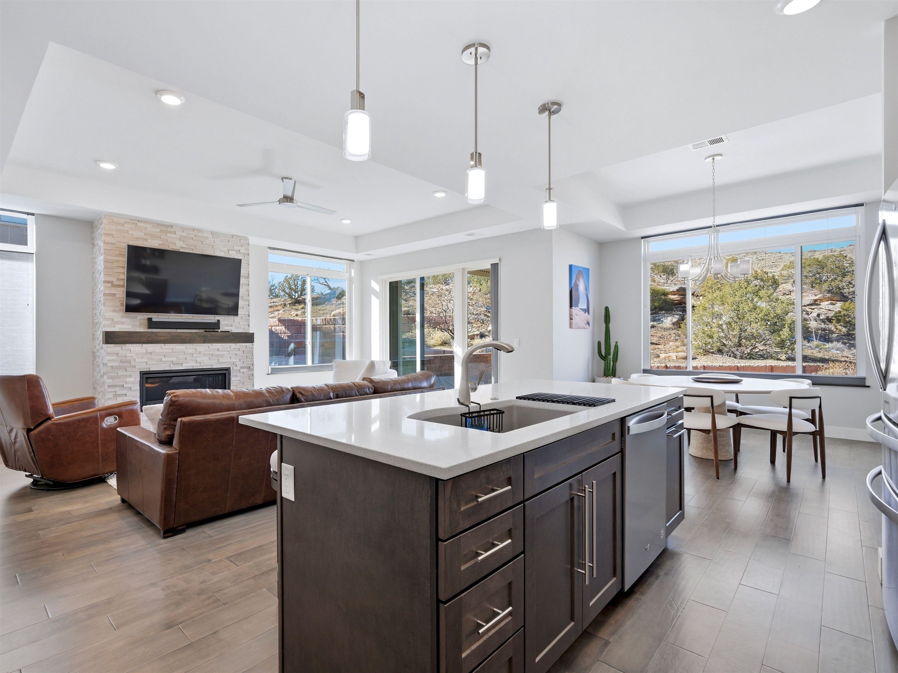380 West Ridges Boulevard, Unit A Grand Junction, CO 81507 - Photo 8 of 41 a kitchen with sink stove and living room