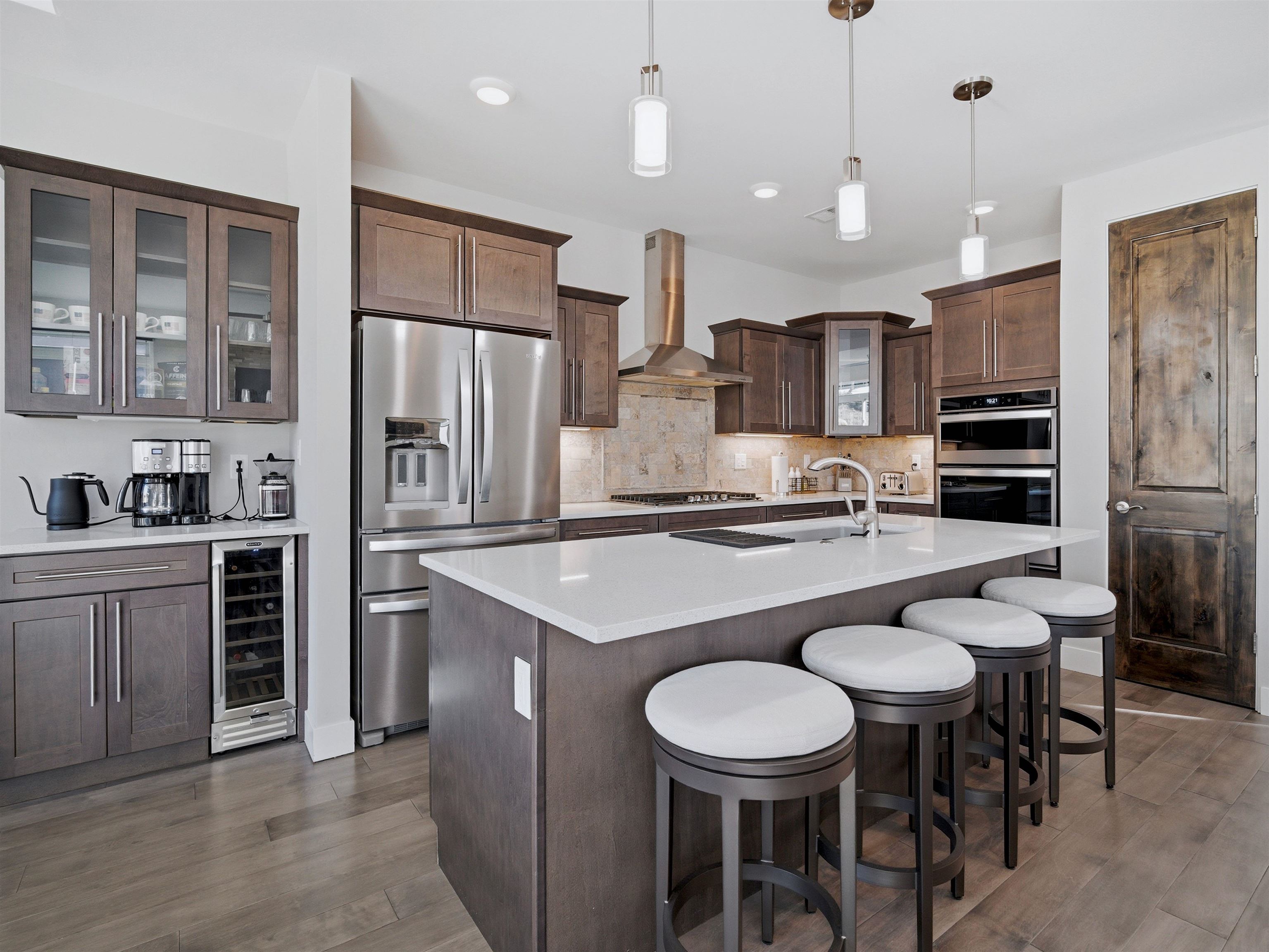 380 West Ridges Boulevard, Unit A Grand Junction, CO 81507 - Photo 9 of 41 a kitchen with stainless steel appliances granite countertop a sink and a refrigerator