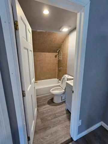 a bathroom with a sink and toilet