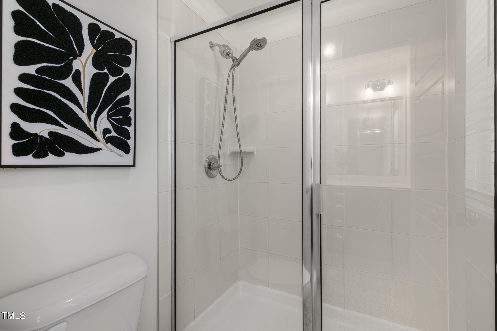 237 Daniel Ridge Road Wendell, NC 27591 - Photo 25 of 41 a bathroom with a shower curtain