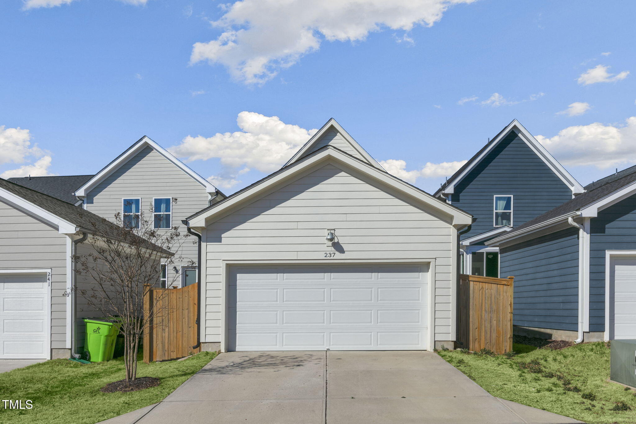 237 Daniel Ridge Road Wendell, NC 27591 - Photo 32 of 41 a view of house with a yard and garage
