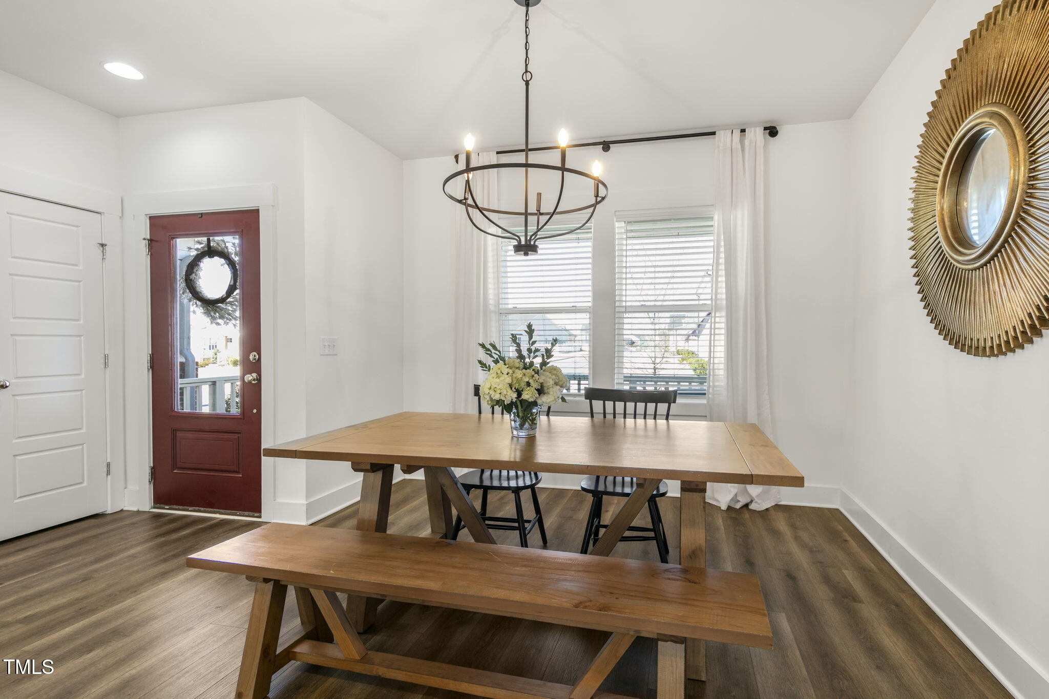 237 Daniel Ridge Road Wendell, NC 27591 - Photo 6 of 41 a view of a dining room with furniture window and wooden floor