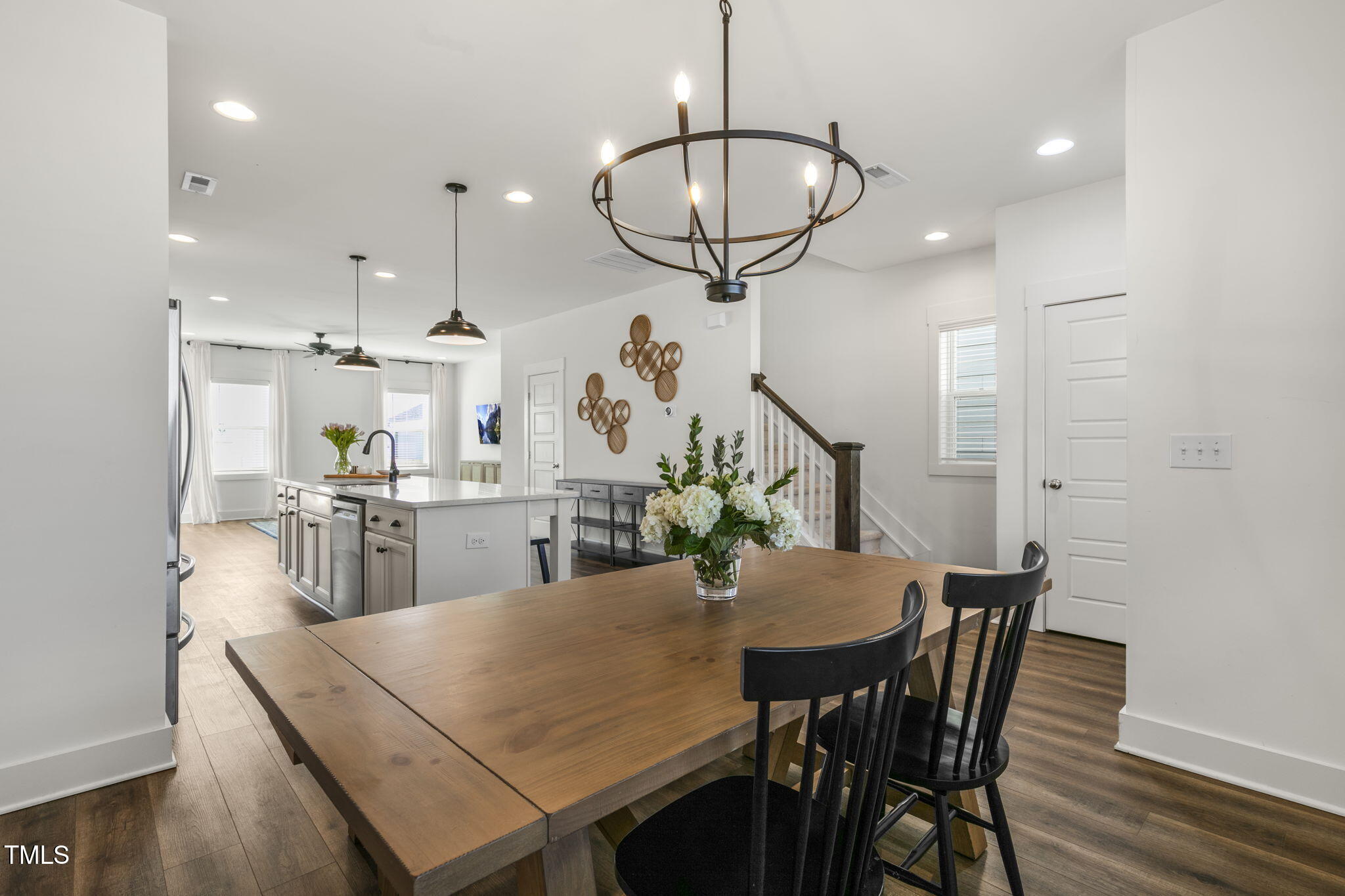 237 Daniel Ridge Road Wendell, NC 27591 - Photo 8 of 41 a view of a dining room with furniture and wooden floor