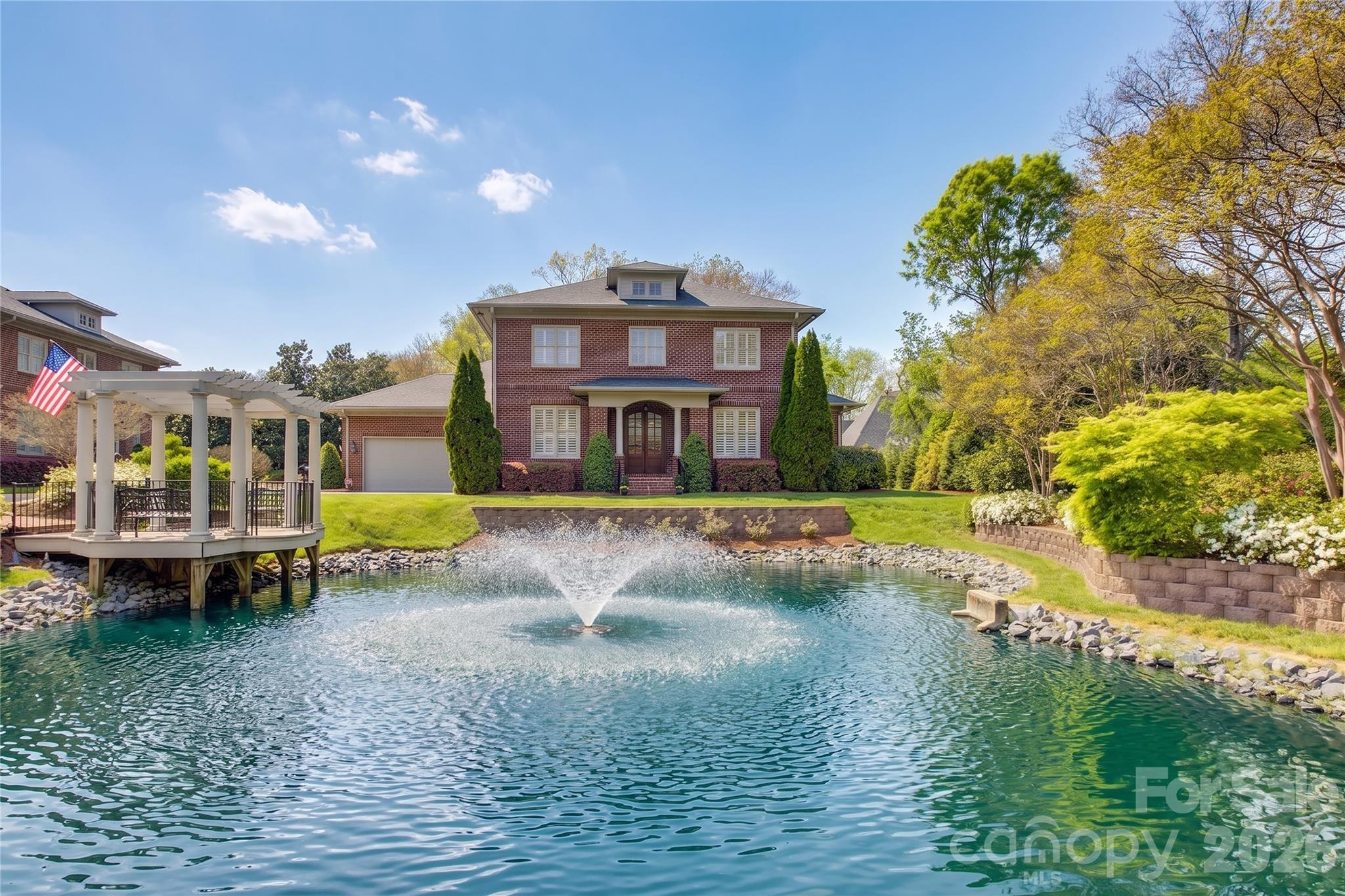 5060 Carmel Road Charlotte, NC 28226 - Photo 2 of 46 a view of a house with a swimming pool