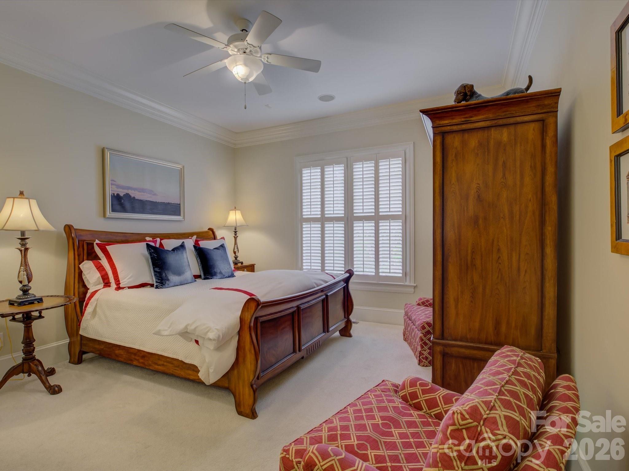 5060 Carmel Road Charlotte, NC 28226 - Photo 22 of 46 a bedroom with a bed and a window