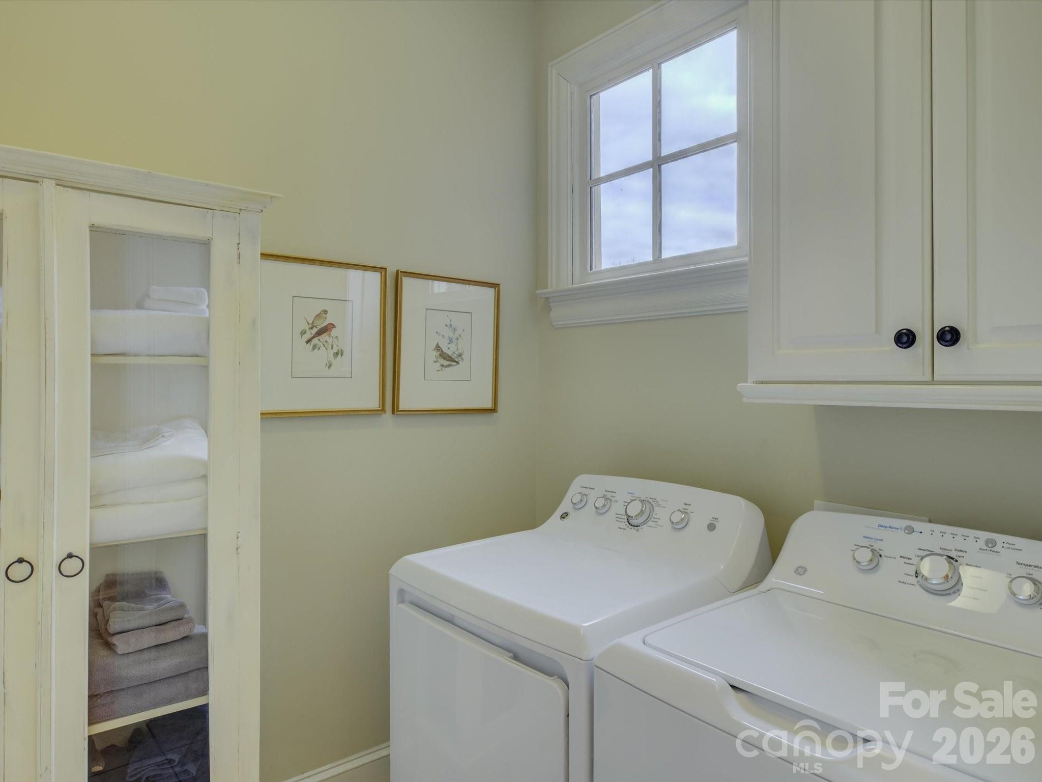 5060 Carmel Road Charlotte, NC 28226 - Photo 26 of 46 a utility room with dryer and washer