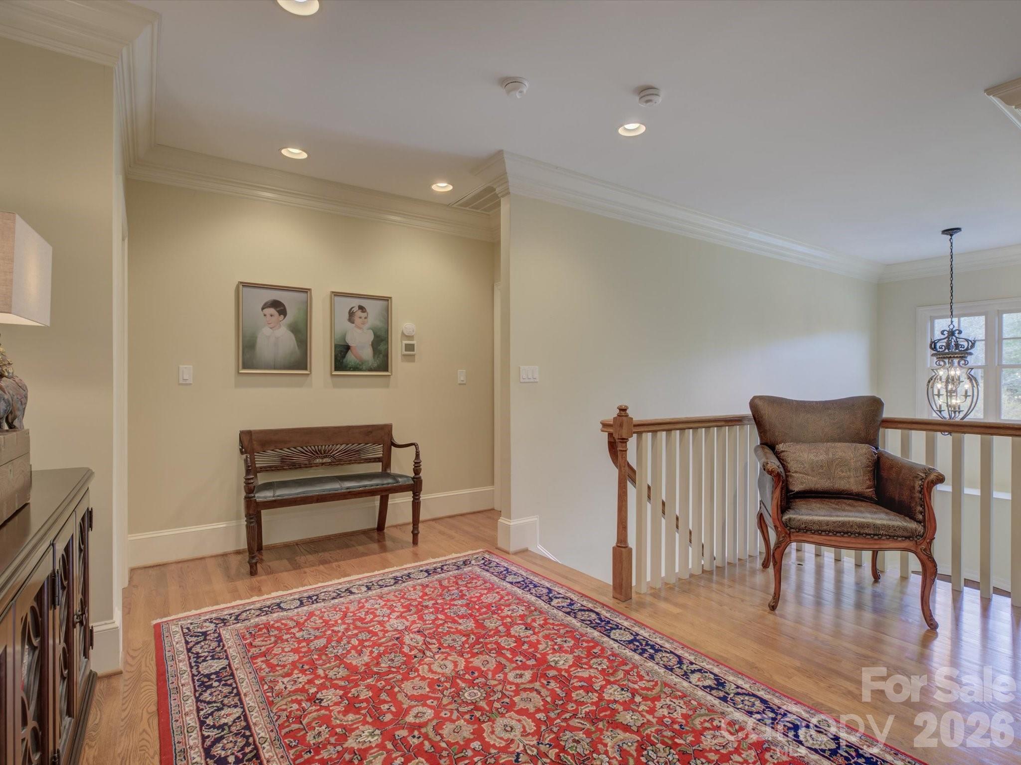 5060 Carmel Road Charlotte, NC 28226 - Photo 28 of 46 a living room with furniture and a rug