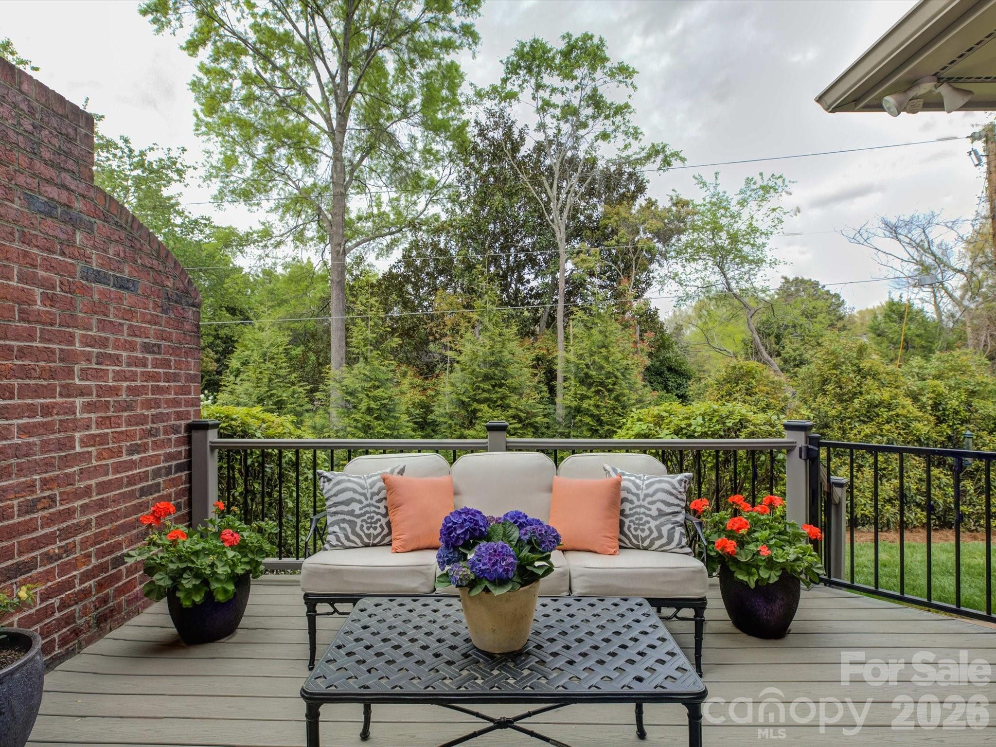 5060 Carmel Road Charlotte, NC 28226 - Photo 37 of 46 a view of a chairs and table on the terrace