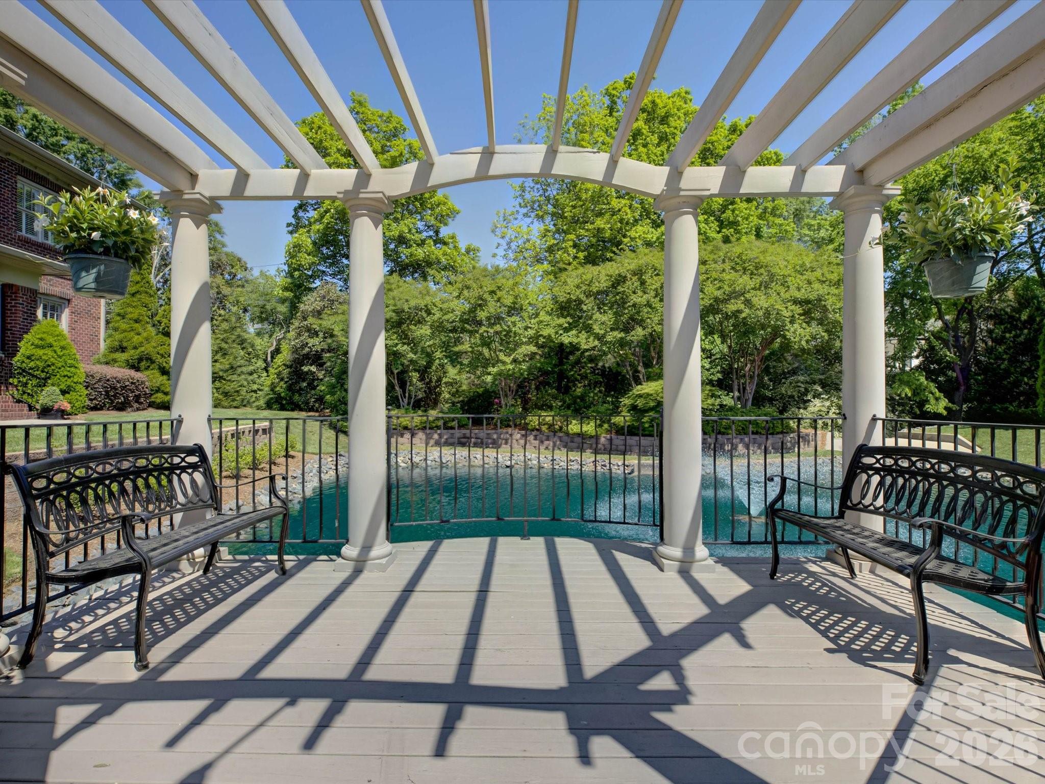 5060 Carmel Road Charlotte, NC 28226 - Photo 44 of 46 a view of a patio with a table chairs and a backyard