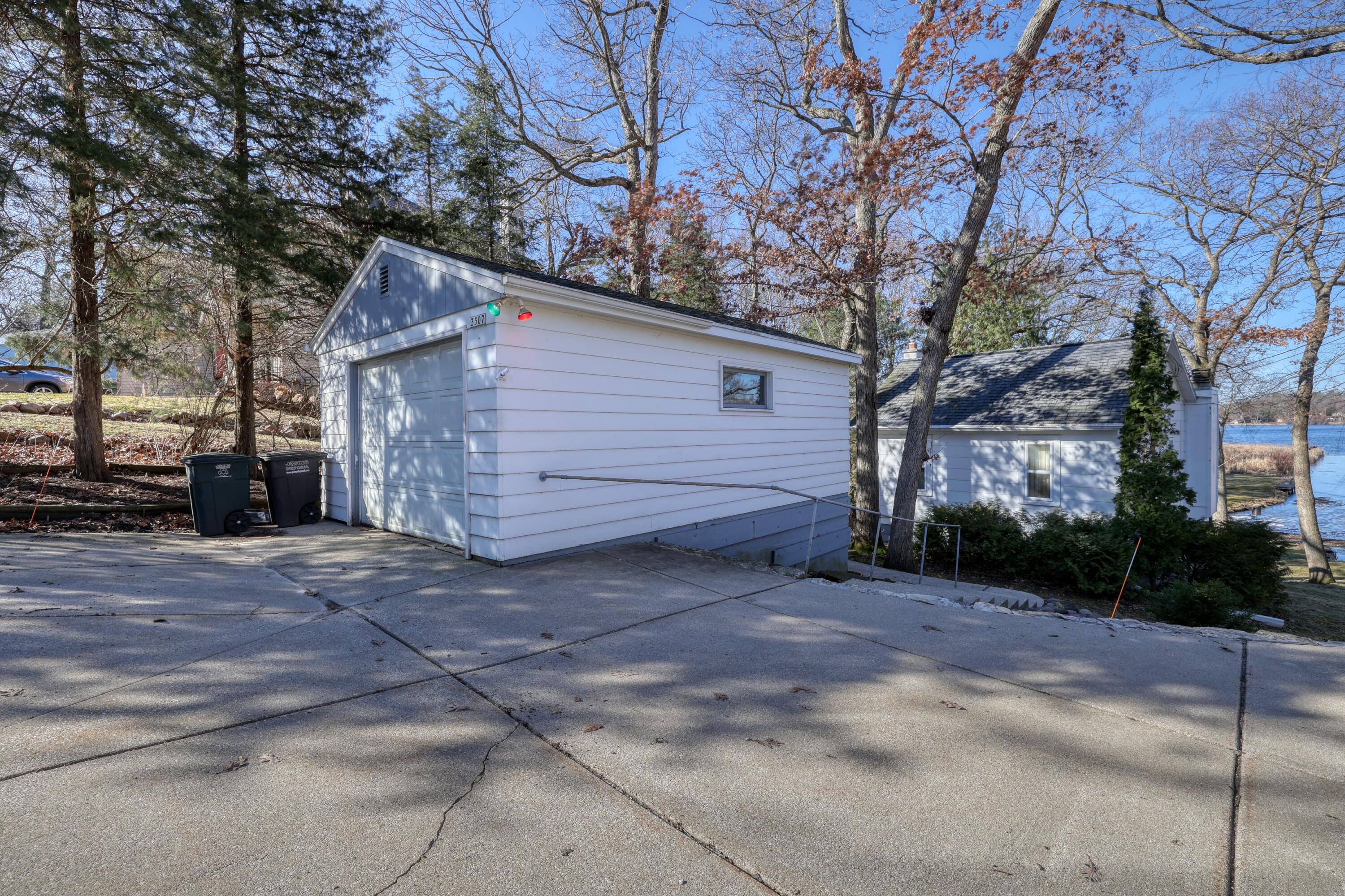 3513 Ridge Drive, Unit 3507 Delafield, WI 53029 - Photo 21 of 29 Garage Cottage